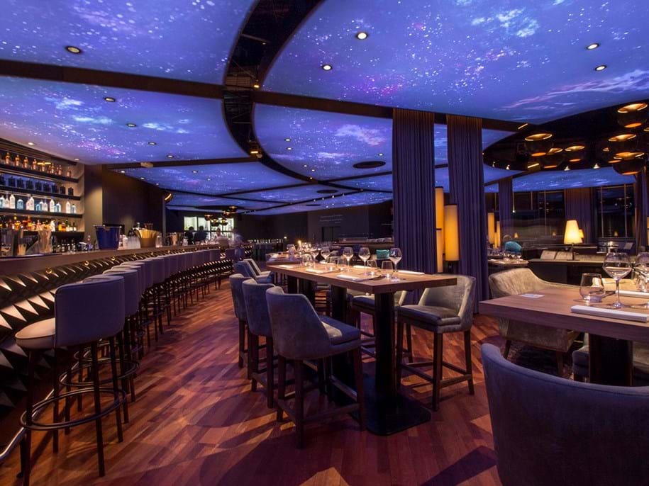 Restaurant with acoustic stretch fabric ceiling
