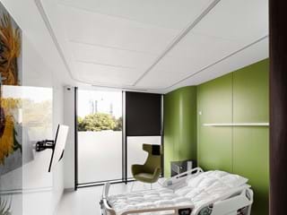 Acoustic ceiling with concealed grid in patient room
