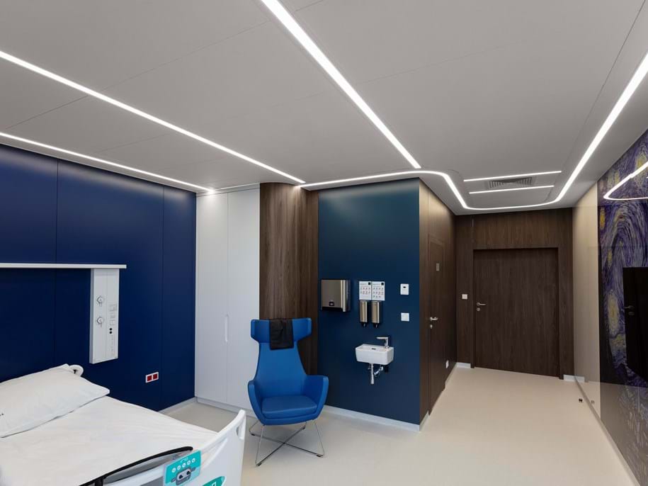 Acoustic ceiling with concealed grid in patient room