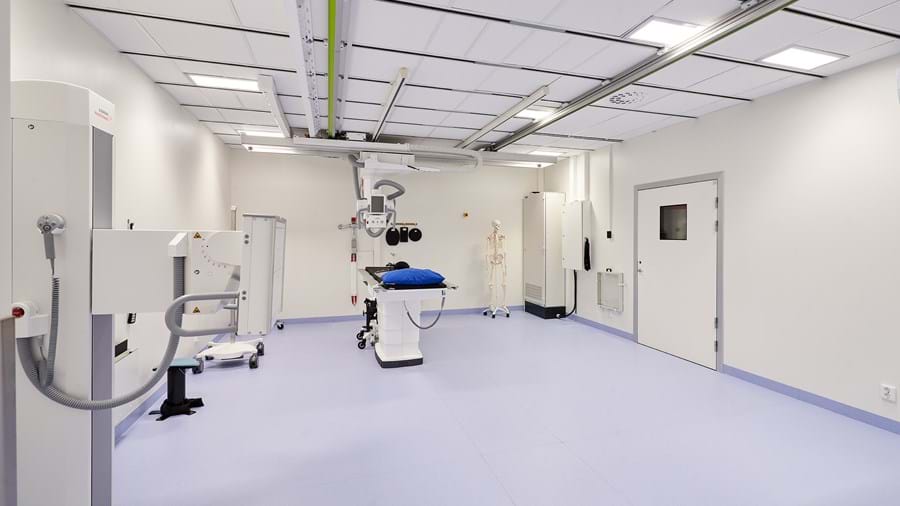 White, suspended acoustic ceiling in radiology facility