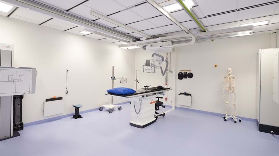 White, suspended acoustic ceiling in radiology facility