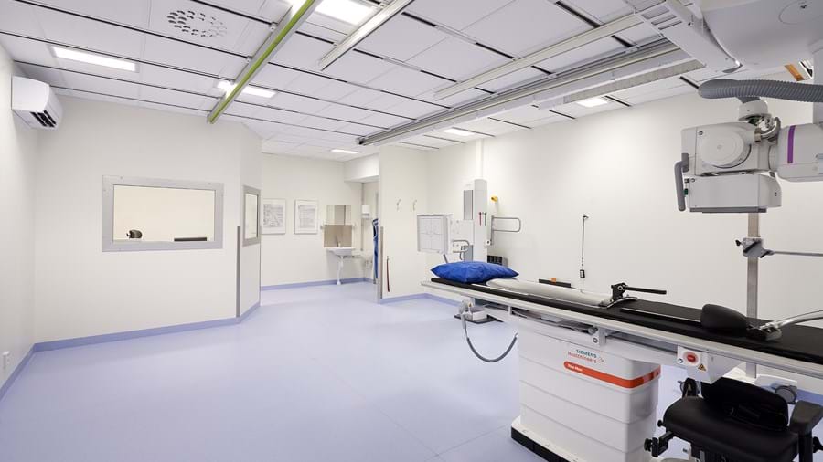 White, suspended acoustic ceiling in radiology facility