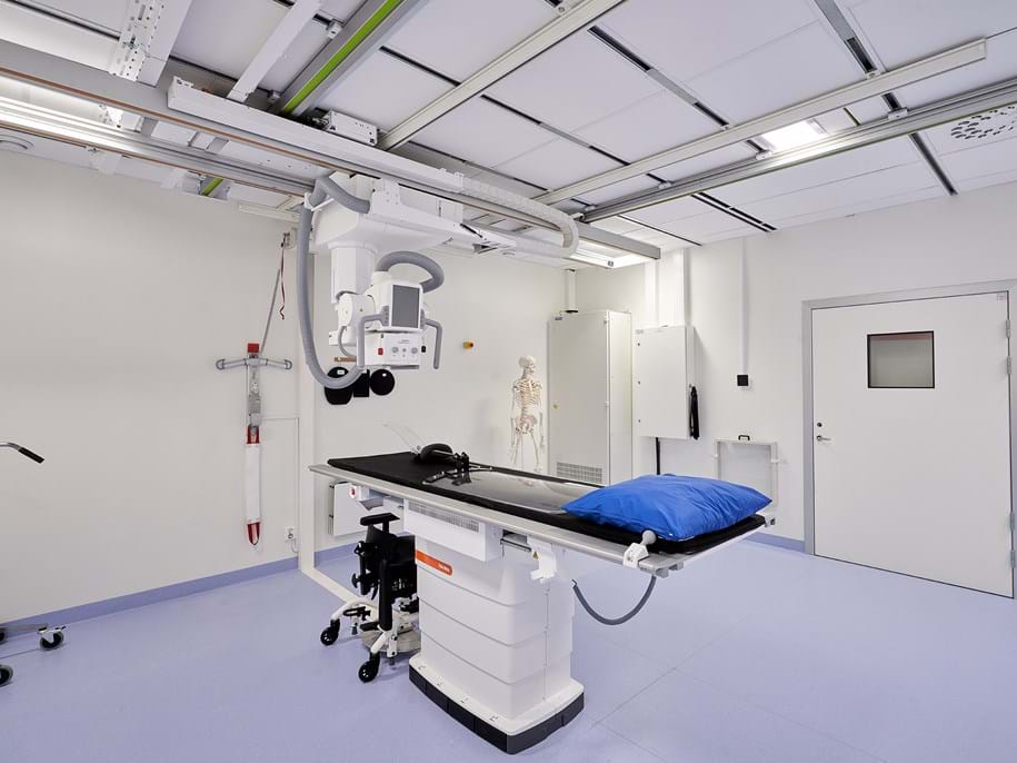White, suspended acoustic ceiling in radiology facility