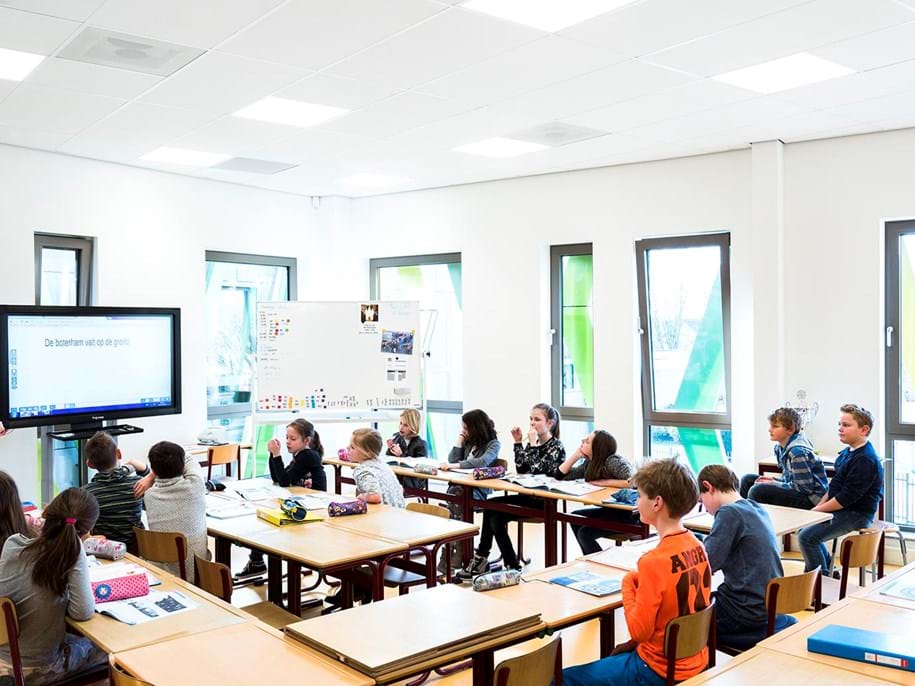 Suspended acoustic ceiling in classrom with children