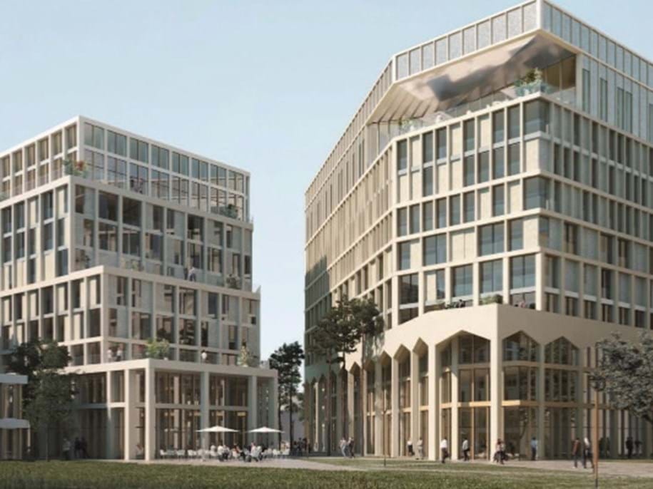 Moderní architektonický design se dvěma sousedními kancelářskými budovami s velkými prosklenými okny a geometrickými vzory. Struktury jsou obklopeny zelení a kolemjdoucími lidmi, což naznačuje obchodní nebo městské prostředí.